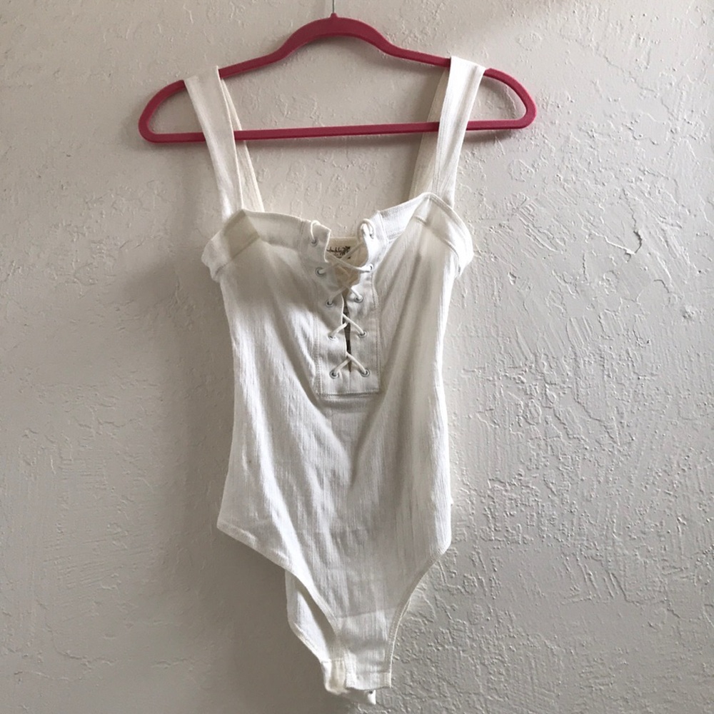 Brand new Free People white lace up bodysuit